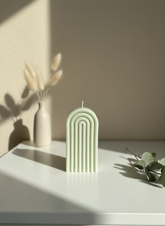 Arch candle in cosy minimalist home setting