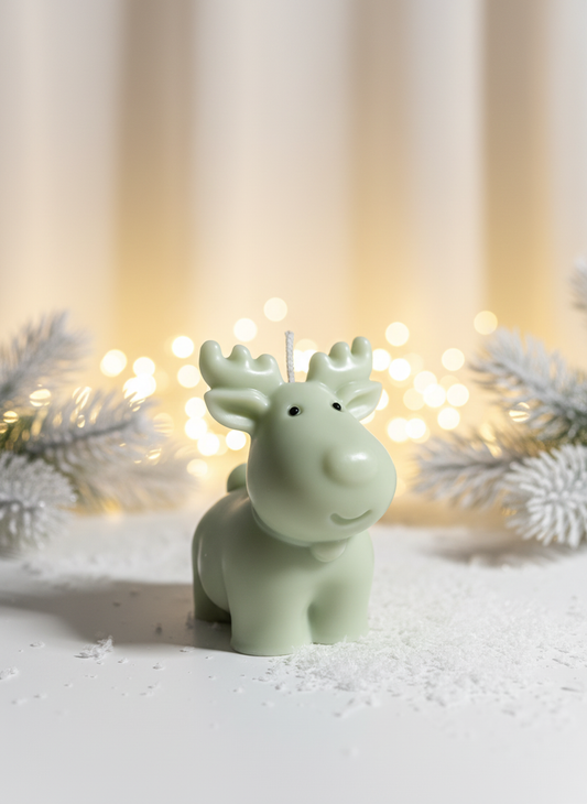 Reindeer candle with black eyes in cosy Christmas setting